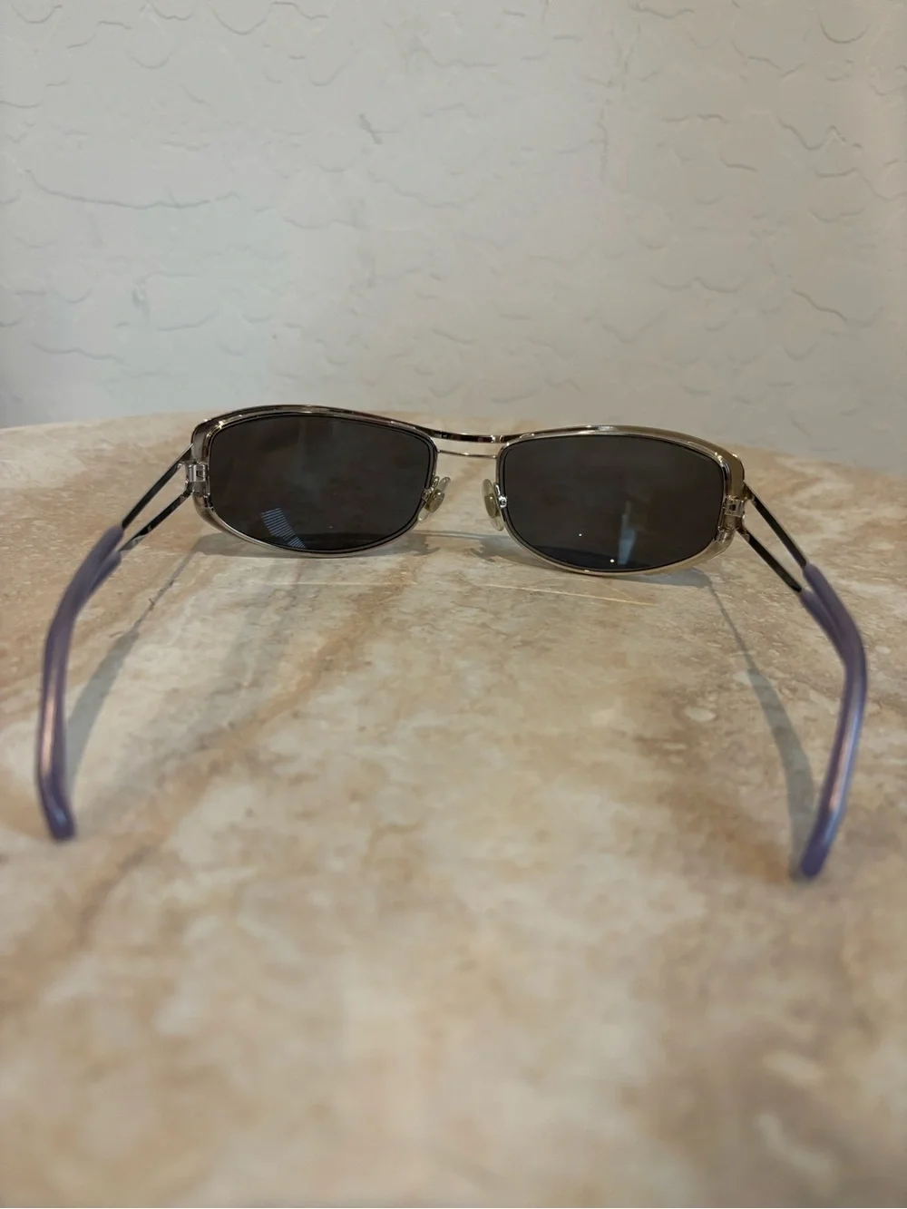 Hiero Elongated Oval Sleek Silver Frame Sunglasses with Dark Lenses